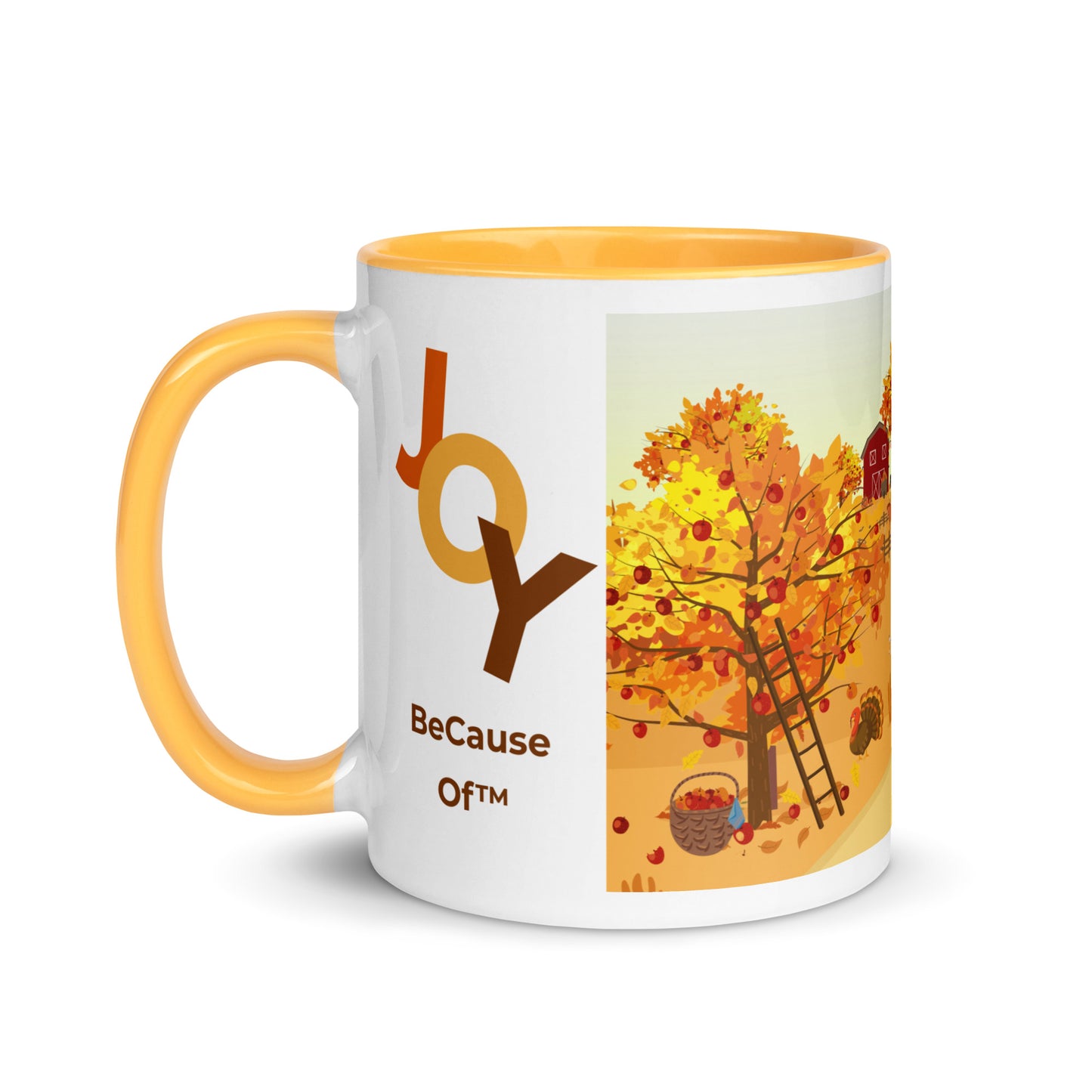 Mug with 'JOY Because Of' text and autumn-themed design on a white background