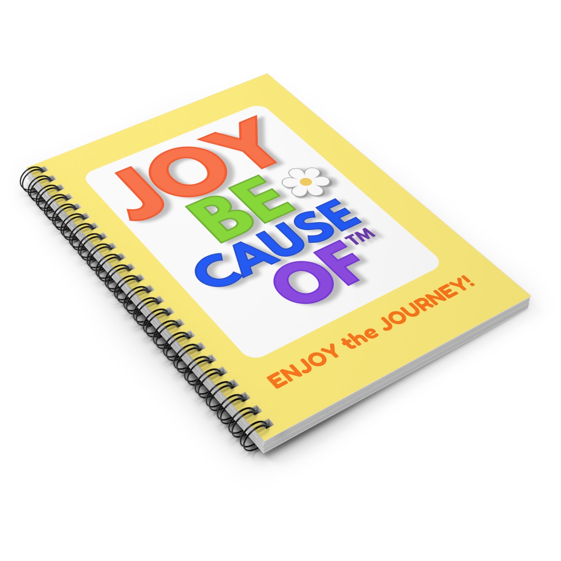 Notebook with joyful, colorful text on a white background